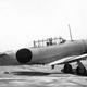 The original Beetle Bomb, a yellow North American SNJ with a “meatball” on the side and a zero on the tail. (Author unknown)